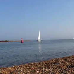 Cooling off beside sifting waves at Felixstowe Ferry